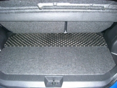 NISSAN 849069U00A Полка в багажник (двухсекционная) задняя часть
